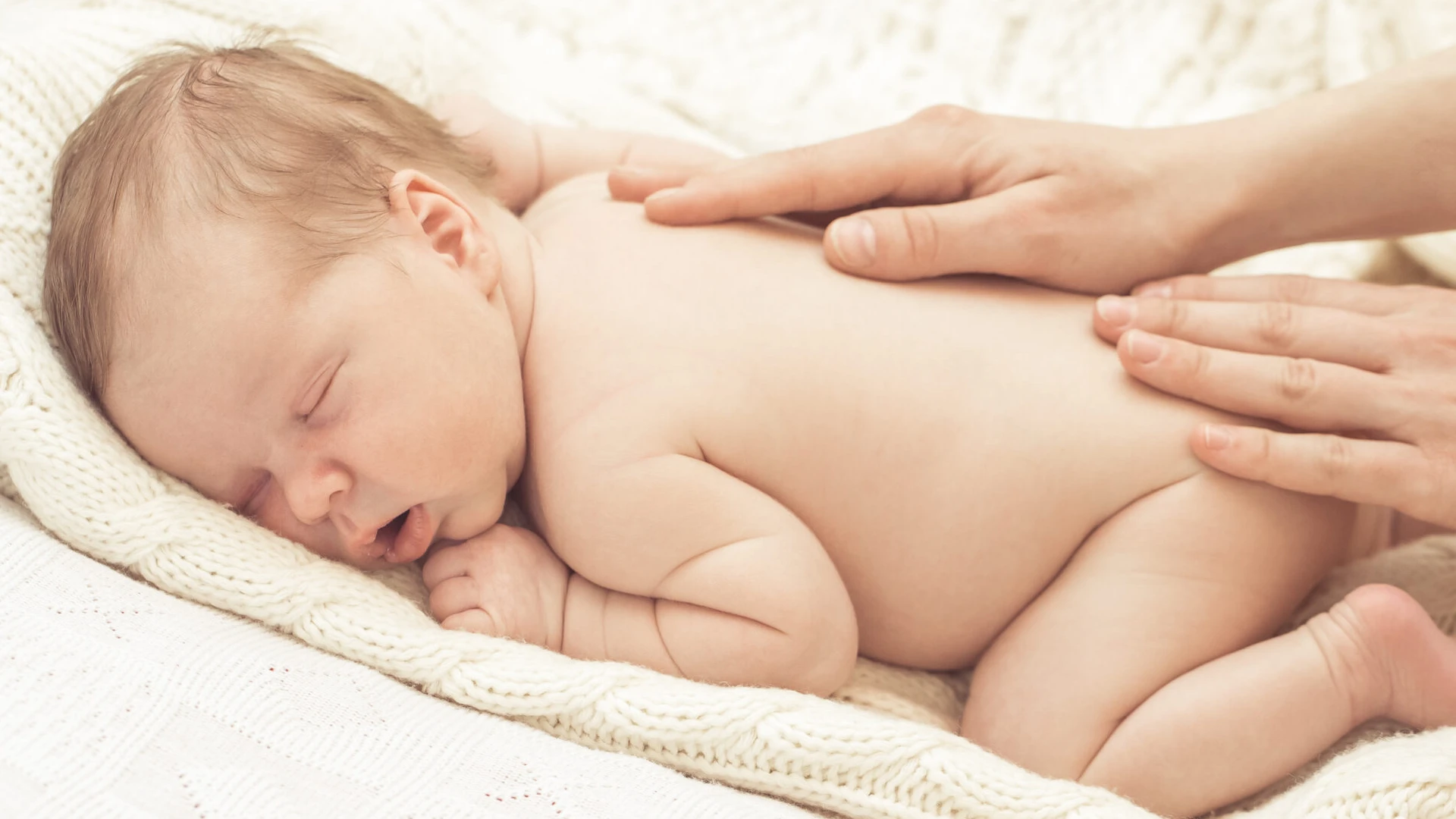 Infant back massage.
